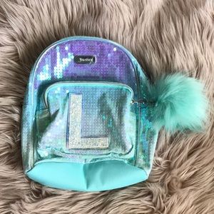 justice mini backpack with the letter L